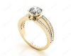 Round Cut 4 Claw Split Shank Engagement Ring with Grain Set Side Stones in 18K Yellow