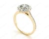 Round Cut Flower Halo Diamond Ring with a Claw Set Halo and Pave Set Side Stones in 18K Yellow