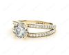 Round Cut 4 Claw Split Shank Engagement Ring with Grain Set Side Stones in 18K Yellow