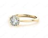 Round Cut Four Claw Set Diamond Ring With a Plain Band in 18K Yellow