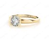 Round Cut Bezel Set Diamond Ring on a Plain Band. in 18K Yellow