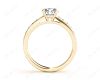 Round Cut Four Claws Set Diamond Ring with Channel Set Side Stones in 18K Yellow