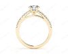 Round Cut Four Claw Set Diamond Ring with Round Pave Set Stones Down the Shoulders in 18K Yellow