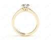 Round cut diamond ring with four claws set centre stone in 18K Yellow