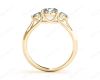 Round Cut Trilogy Diamond Engagement Ring cross-over setting in 18K Yellow