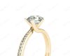 Round Cut Five Claw Twist band claw set diamond with grain set side stone in 18K Yellow