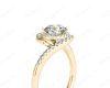 Round Cut Halo Diamond Cross Over Engagement ring with claw set centre stone in 18K Yellow