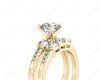 Round Cut Diamond trilogy wedding set rings with claw set side stone in 18K Yellow