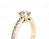 Round Cut Four Claws Set Diamond Ring with Channel Set Side Stones in 18K Yellow