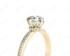 Round Cut Four Claw Set Hidden Halo Diamond Ring with Round Cut Diamonds Pave Set Down the Shoulders and on the Setting in 18K Yellow