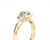 Round Cut Trilogy Diamond Engagement Ring cross-over setting in 18K Yellow