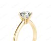 Solitaire Round Cut 6 Claw Diamond Engagement Ring With A Tapered Band  In 18K Yellow