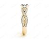 Twist Band Round Cut Four Claw Set Diamond Ring with Pave Set Stones Down the Shoulders In  18K Yellow