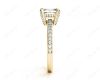 Emerald Cut Four Claw Diamond Ring with grain set side stones in 18K Yellow