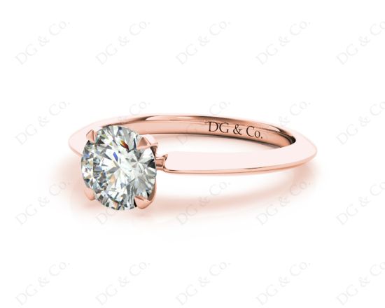 Round Cut Solitaire Diamond Engagement Ring with Four Prong set centre stone and a Knife Edge Band in 18K Rose