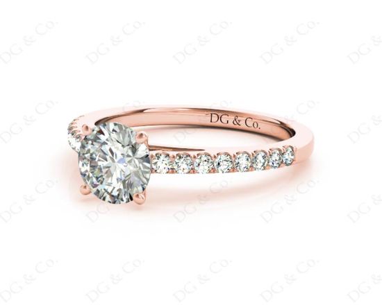 Round Cut Four Claw Set Diamond Ring with Round Pave Set Stones Down the Shoulders in 18K Rose