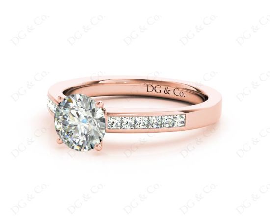 Round cut diamond ring with four claws set centre stone in 18K Rose