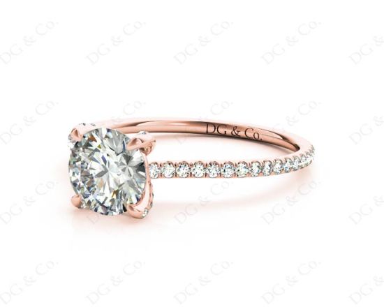 Round Cut Cross Over ring claw set diamond with pave set side stone in 18K Rose