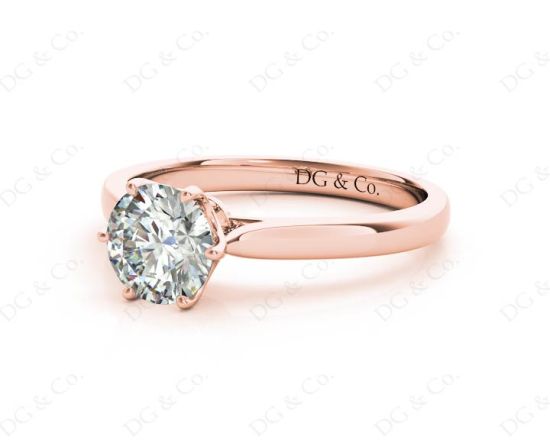 Round Cut Six Claw Set Diamond Ring on a Plain Band in 18K Rose