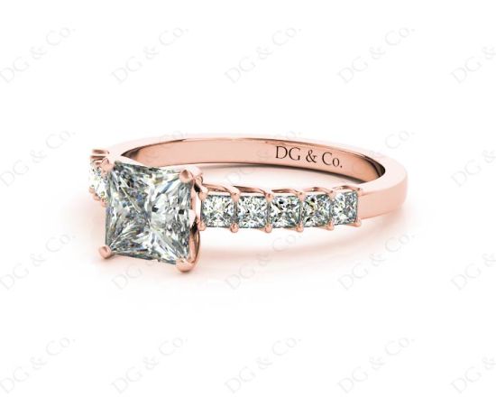 Princess Cut Four Claw Set Diamond Ring with Princess Cut Stones Down the Shoulders and Brilliant Stones on Sides. in 18K Rose