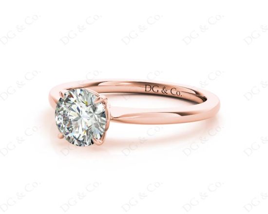 Round Cut Four Claw Set Diamond Ring With a Plain Band in 18K Rose