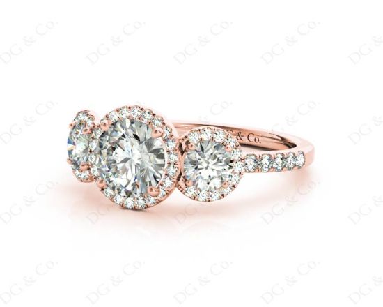 Round Cut Triple Halo Diamond Engagement ring with claw set centre stone in 18K Rose