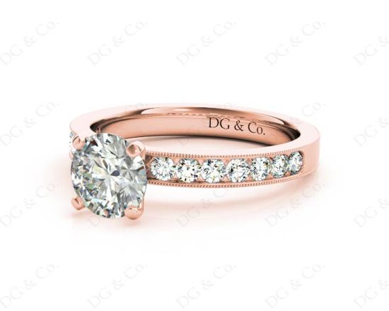 Round Cut Four Claw Set Diamond Ring with Channel Set Side Stones Down the Shoulders in 18k Rose