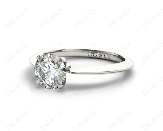 Round Cut Solitaire Diamond Engagement Ring with Four Prong set centre stone and a Knife Edge Band in 18k White