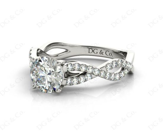 Twist Band Round Cut Four Claw Set Diamond Engagement Ring with Pave Set Stones Down the Shoulders in 18K White