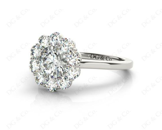 Round Cut Halo Diamond Engagement ring with claw set centre stone in Platinum