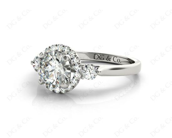 Round Cut Halo Trilogy diamond ring with pave set side stone in Platinum