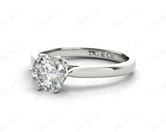 Round Cut Six Claw Set Diamond Ring on a Plain Band in Platinum