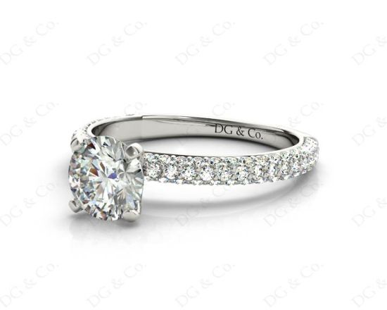 Round Cut claw set diamond ring with micro pave set side stone in 18K White