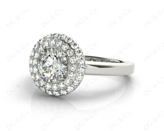 Round Cut Double Halo Diamond Engagement ring with claw set centre stone in Platinum