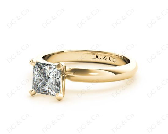 Princess Cut Classic Four Claw Diamond Solitaire Ring with Half Round Edge Shoulders in 18K Yellow