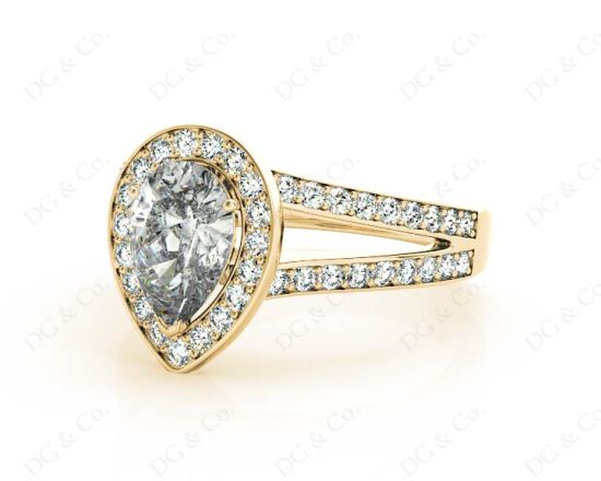 Pear Shape Halo Diamond ring with claw set centre stone in 18K Yellow