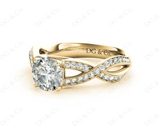 Twist Band Round Cut Four Claw Set Diamond Ring with Pave Set Stones Down the Shoulders In  18K Yellow