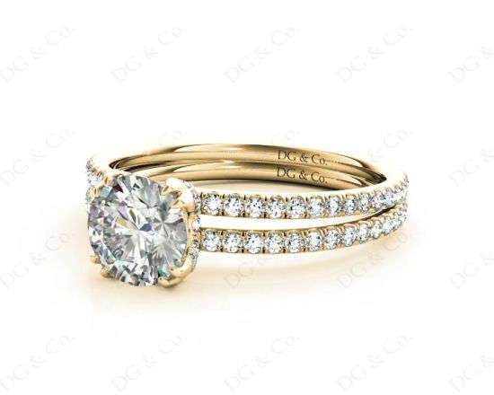 Round Cut Four Double Claw Set Diamond Ring with Pave Set Diamonds Down The Shoulders in 18K Yellow