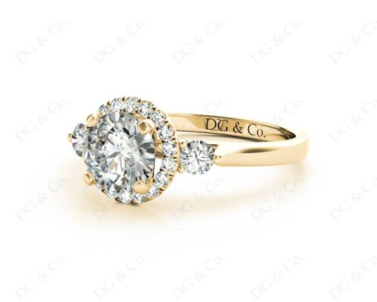 Round Cut Halo Trilogy diamond ring with pave set side stone in 18K Yellow