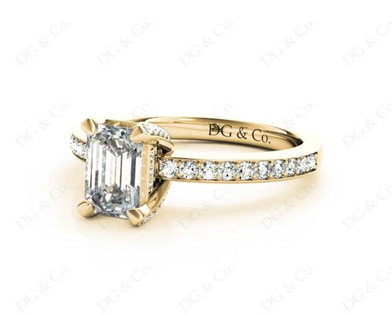 Emerald Cut Four Claw Diamond Ring with grain set side stones in 18K Yellow