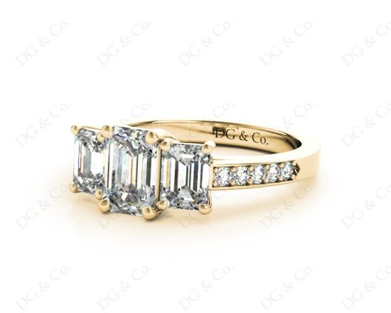 Emerald Cut Trilogy Ring with Channel Set Shoulder Diamonds in 18K Yellow