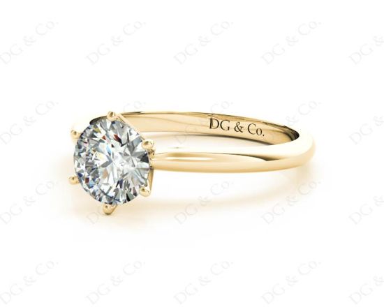 Solitaire Round Cut 6 Claw Diamond Engagement Ring With A Tapered Band  In 18K Yellow