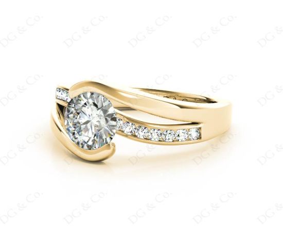 Round Cut Cross Over Ring Half Bezel Set Diamond Engagement Ring with Channel Set Side Stones in 18K Yellow