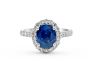 Halo Blue Sapphire Oval Cut Diamond Engagement Ring In 18 Karat White Gold