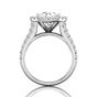 Round Cut Halo Diamond Engagement Ring With Four Claw Setting Centre Stone Triple-split Shoulders Pave Setting on the band.-Platinum