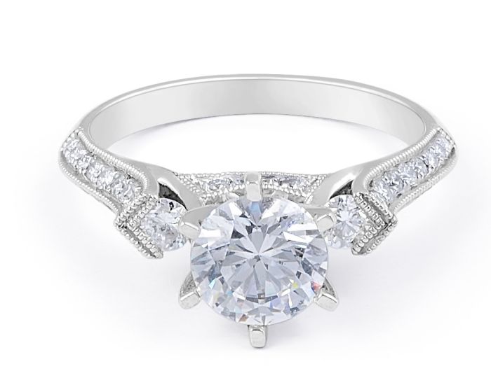 Brilliant Cut Diamond Engagement Ring in 18 Karat White Gold Grain Set 